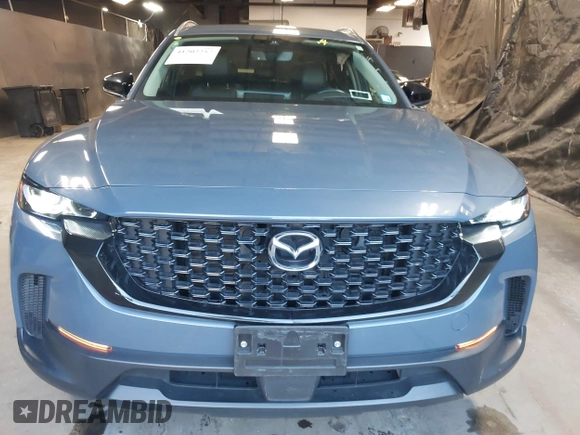 2023 Mazda CX-50 S Premium Plus with VIN 7MMVABEM3PN108555, listed as a IAAI auction lot 41202257 with 21,258 mi miles and . Bid and sale history available at DreamBid. Image 12.