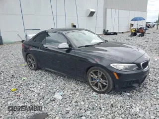 2015 BMW 2 Series M235i with VIN WBA1J7C55FV289435, listed as a Copart auction lot 59089955 with 122,328 mi miles and Salvage title. Bid and sale history available at DreamBid. Image 4.