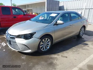 2015 Toyota Camry Hybrid LE with VIN 4T1BD1FK1FU174975, listed as a IAAI auction lot 42085034 with 54,728 mi miles. Bid and sale history available at carsss.com. Image 18.