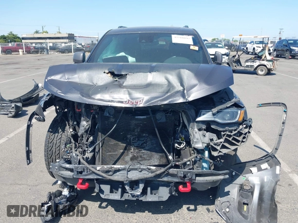 2017 Jeep Grand Cherokee Trailhawk with VIN 1C4RJFLG7HC654259, listed as a IAAI auction lot 42510197 with 103,947 mi miles and . Bid and sale history available at DreamBid. Image 6.