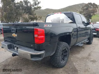 2014 Chevrolet Silverado 1500 LT with VIN 3GCUKREC2EG552511, listed as a IAAI auction lot 41745914 with 196,182 mi miles. Bid and sale history available at carsss.com. Image 4.