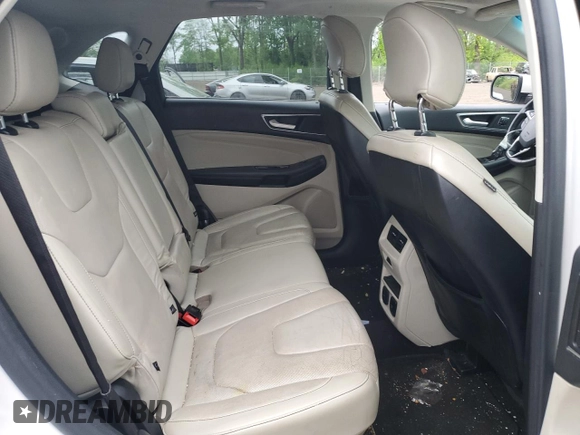 2015 Ford Edge Titanium z VIN 2FMPK4K88FBC05216, wystawiony jako Copart lot #56523475 z przebiegiem 156 558 mil mil oraz Szkoda całkowita • Salvage title. Historia ofert i sprzedaży dostępna na DreamBid. Obrazek 11.
