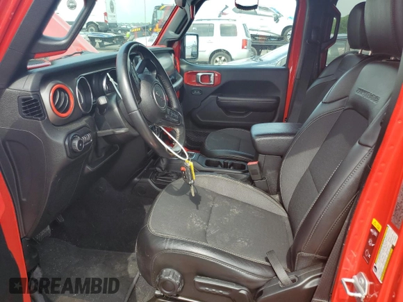 2020 Jeep Wrangler Unlimited Sport Altitude with VIN 1C4HJXDG2LW206079, listed as a Copart auction lot 59040695 with 77,917 mi miles and Salvage title. Bid and sale history available at DreamBid. Image 7.