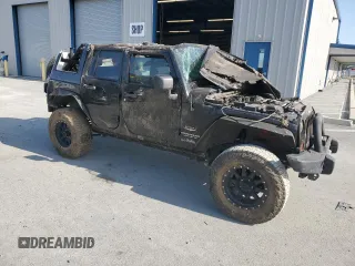 2012 Jeep Wrangler Unlimited Sahara with VIN 1C4BJWEG5CL235835, listed as a Copart auction lot 60673555 with 86,606 mi miles and Salvage title. Bid and sale history available at DreamBid. Image 4.