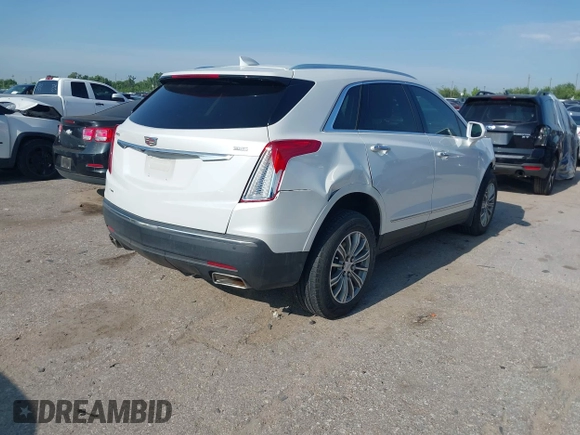 2018 Cadillac XT5 Luxury FWD with VIN 1GYKNCRS2JZ174756, listed as a IAAI auction lot 42192036 with 63,684 mi miles and . Bid and sale history available at carsss.com. Image 4.