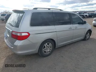 2005 Honda Odyssey TOURING with VIN 5FNRL38855B035443, listed as a IAAI auction lot 41748539 with 1 mi miles. Bid and sale history available at carsss.com. Image 4.