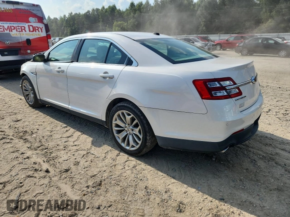 2013 Ford Taurus Limited with VIN 1FAHP2F88DG102737, listed as a Copart auction lot 63327915 with 87,009 mi miles and Salvage title. Bid and sale history available at DreamBid. Image 2.