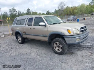 2002 Toyota Tundra SR5 with VIN 5TBBT44112S292924, listed as a IAAI auction lot 41958993 with 216,550 mi miles. Bid and sale history available at carsss.com. Image 1.