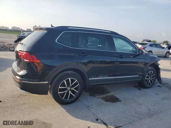 2021 Volkswagen Tiguan SE with VIN 3VV3B7AXXMM085722, listed as a Copart auction lot 54438285 with 76,746 mi miles and Clean Title. Bid and sale history available at carsss.com. Image 3.
