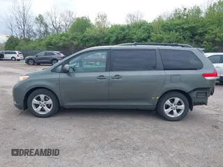 2014 Toyota Sienna LE AAS with VIN 5TDKK3DC8ES432364, listed as a IAAI auction lot 42081378 with 187,131 mi miles and . Bid and sale history available at DreamBid. Image 15.