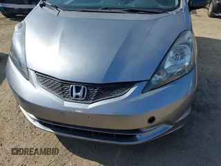 2009 Honda Fit with VIN JHMGE88239S025012, listed as a IAAI auction lot 42584028 with 163,965 mi miles and . Bid and sale history available at DreamBid. Image 6.