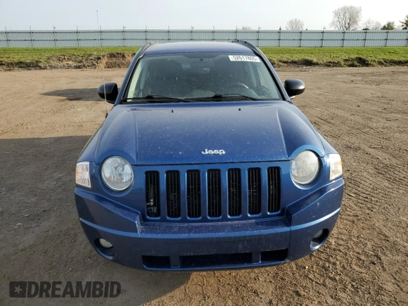 2010 Jeep Compass North Edition with VIN 1J4NF4FB2AD575774, listed as a Copart auction lot 52617805 with 130,645 mi miles and Clean Title. Bid and sale history available at carsss.com. Image 5.