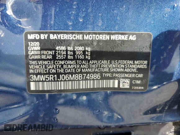 2021 BMW 3 Series 330i with VIN 3MW5R1J06M8B74986, listed as a Copart auction lot 60648895 with Not provided miles and Salvage title. Bid and sale history available at DreamBid. Image 13.