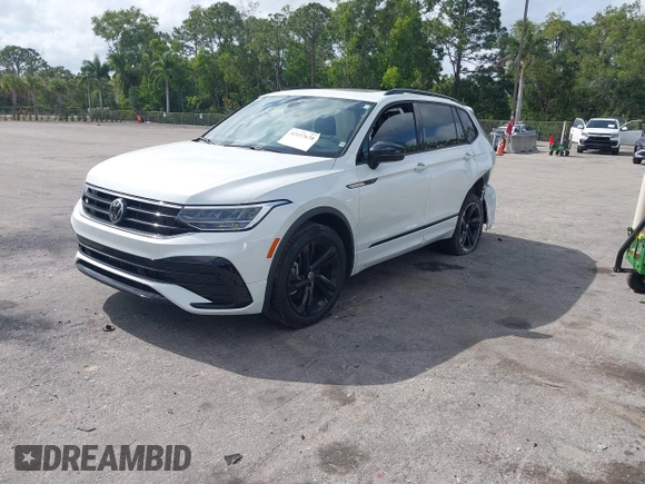 2024 Volkswagen Tiguan SE R-Line Black with VIN 3VVCB7AX6RM093792, listed as a IAAI auction lot 42117670 with 15,379 mi miles and . Bid and sale history available at DreamBid. Image 16.