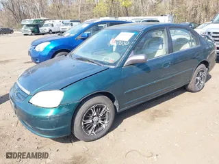 2002 Honda Civic LX with VIN 1HGES16552L011961, listed as a IAAI auction lot 42107230 with 172,787 mi miles. Bid and sale history available at carsss.com. Image 6.