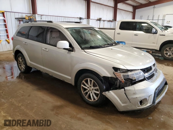 2013 Dodge Journey SXT with VIN 3C4PDCBG3DT699762, listed as a Copart auction lot 53712395 with 145,360 mi miles and Salvage Title. Bid and sale history available at carsss.com. Image 4.