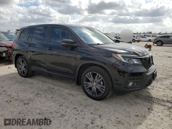 2021 Honda Passport EX-L with VIN 5FNYF7H53MB016100, listed as a Copart auction lot 82453154 with 24,772 mi miles and Salvage Title. Bid and sale history available at carsss.com. Image 4.