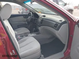 2007 Kia Optima LX with VIN KNAGE124575112468, listed as a IAAI auction lot 41816122 with 177,880 mi miles. Bid and sale history available at carsss.com. Image 5.