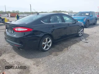 2016 Ford Fusion SE with VIN 3FA6P0HD6GR170697, listed as a IAAI auction lot 42076822 with 114,477 mi miles. Bid and sale history available at carsss.com. Image 4.