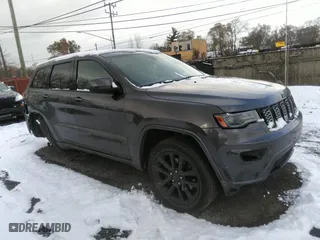 2021 Jeep Grand Cherokee Laredo X with VIN 1C4RJFAG8MC823847, listed as a IAAI auction lot 40986916 with 69,055 mi miles. Bid and sale history available at carsss.com. Image 1.