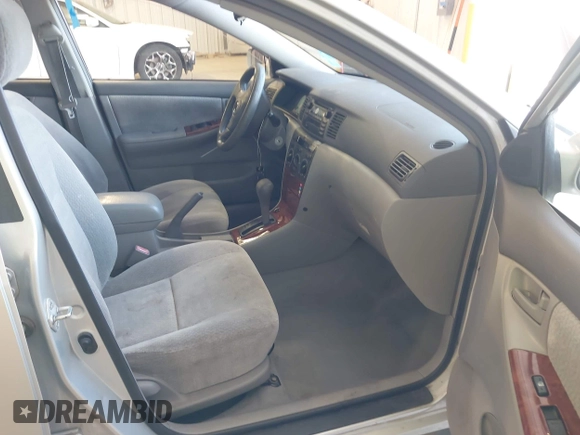 2003 Toyota Corolla CE with VIN 1NXBR32E73Z150110, listed as a IAAI auction lot 42057958 with 299,999 mi miles and . Bid and sale history available at DreamBid. Image 5.