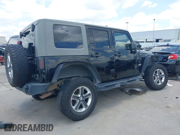 2008 Jeep Wrangler Unlimited Sahara with VIN 1J4GB59198L619802, listed as a IAAI auction lot 42361793 with 272,295 mi miles and . Bid and sale history available at DreamBid. Image 4.
