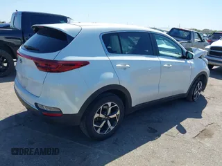 2021 Kia Sportage LX with VIN KNDPM3AC8M7932425, listed as a IAAI auction lot 39067549 with 56,841 mi miles. Bid and sale history available at carsss.com. Image 4.