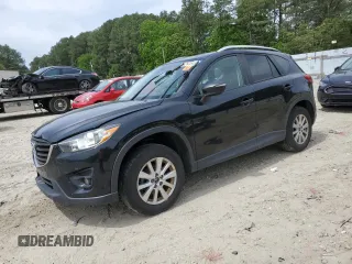 2016 Mazda CX-5 Touring с VIN JM3KE4CY0G0755203, выставлен на аукционе Copart как лот 58392845 с пробегом Не указан миль и Списание • Salvage title. История ставок и продаж доступна на DreamBid. Изображение 1.
