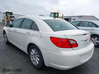2010 Chrysler Sebring Touring with VIN 1C3CC4FB5AN229593, listed as a IAAI auction lot 41971326 with 144,561 mi miles. Bid and sale history available at carsss.com. Image 3.