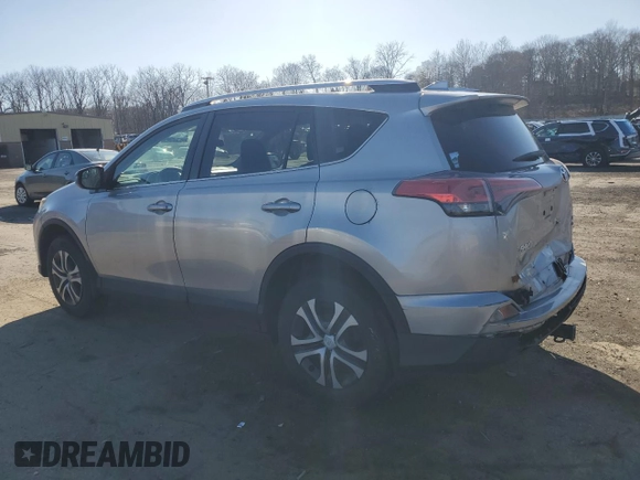 2016 Toyota RAV4 LE with VIN 2T3BFREV4GW451616, listed as a Copart auction lot 50143575 with 128,034 mi miles and Salvage Title. Bid and sale history available at DreamBid. Image 2.