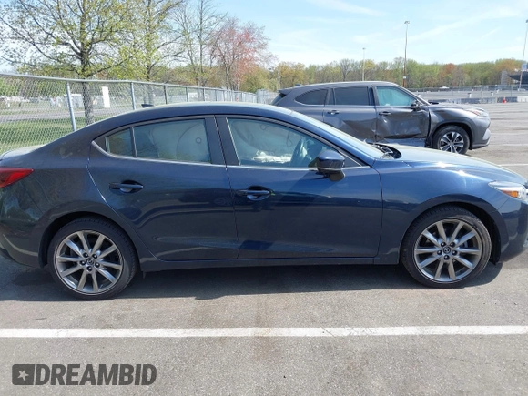 2018 Mazda 3 Grand Touring with VIN 3MZBN1W36JM213063, listed as a IAAI auction lot 42102460 with 49,180 mi miles and . Bid and sale history available at DreamBid. Image 13.