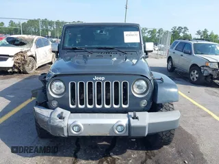 2017 Jeep Wrangler Unlimited Sahara with VIN 1C4HJWEG3HL648158, listed as a IAAI auction lot 42416132 with 95,954 mi miles and . Bid and sale history available at DreamBid. Image 12.