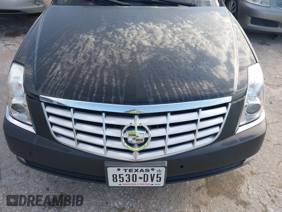2006 Cadillac DTS w/1SC with VIN 1G6KD57Y26U156907, listed as a IAAI auction lot 42101639 with 188,886 mi miles. Bid and sale history available at carsss.com. Image 6.