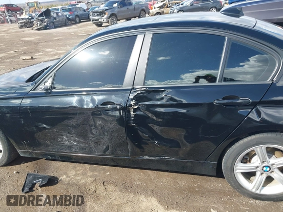 2015 BMW 3 Series 328i xDrive with VIN WBA3B5G56FNS20581, listed as a IAAI auction lot 41692014 with 196,609 mi miles. Bid and sale history available at carsss.com. Image 14.