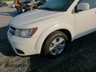2012 Dodge Journey SXT z VIN 3C4PDCBGXCT153166, wystawiony jako Copart lot #53843265 z przebiegiem 177 289 mil mil oraz Szkoda całkowita • Salvage title. Historia ofert i sprzedaży dostępna na DreamBid. Obrazek 14.