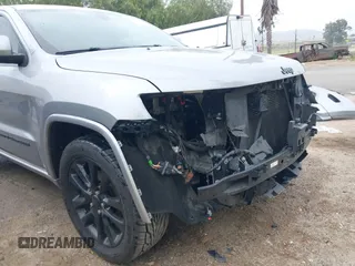 2017 Jeep Grand Cherokee Laredo with VIN 1C4RJEAG0HC702195, listed as a IAAI auction lot 42427597 with 104,403 mi miles and . Bid and sale history available at DreamBid. Image 19.