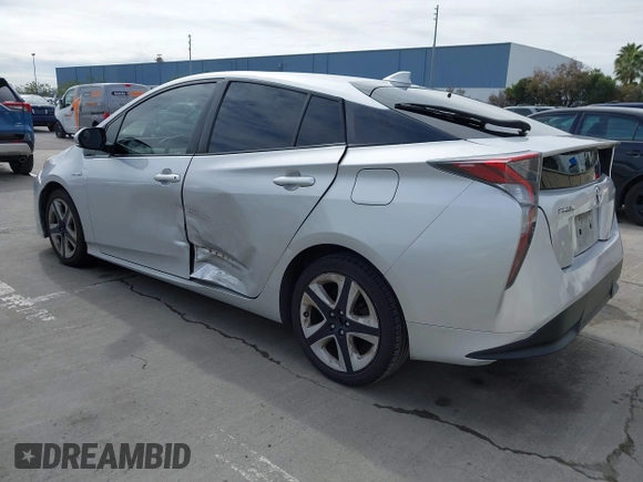 2016 Toyota Prius Four with VIN JTDKARFU9G3008336, listed as a IAAI auction lot 41710594 with 224,479 mi miles and . Bid and sale history available at DreamBid. Image 3.