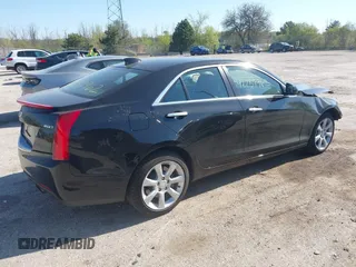 2016 Cadillac ATS Standard AWD z VIN 1G6AG5RX9G0119093, wystawiony jako IAAI lot #42237962 z przebiegiem 41 237 mil mil oraz . Historia ofert i sprzedaży dostępna na DreamBid. Obrazek 4.