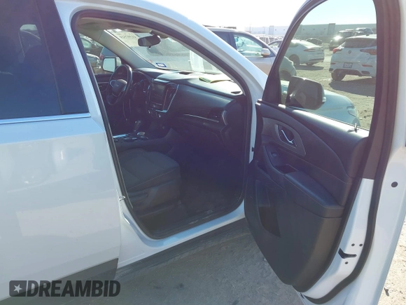 2018 Chevrolet Traverse LT Cloth z VIN 1GNERGKW9JJ214512, wystawiony jako IAAI lot #41397519 z przebiegiem 100 342 mil mil oraz . Historia ofert i sprzedaży dostępna na DreamBid. Obrazek 5.