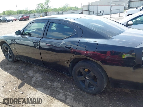 2007 Dodge Charger with VIN 2B3KA43G27H652874, listed as a IAAI auction lot 42030171 with 216,231 mi miles and . Bid and sale history available at DreamBid. Image 16.