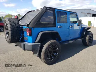 2016 Jeep Wrangler Unlimited Sport z VIN 1C4BJWDG3GL115622, wystawiony jako Copart lot #57872455 z przebiegiem 98 812 mil mil oraz Szkoda całkowita • Salvage title. Historia ofert i sprzedaży dostępna na DreamBid. Obrazek 3.