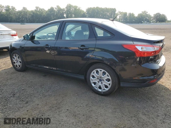 2012 Ford Focus SE with VIN 1FAHP3F22CL455790, listed as a Copart auction lot 60493005 with 100,081 mi miles and Salvage title. Bid and sale history available at DreamBid. Image 2.