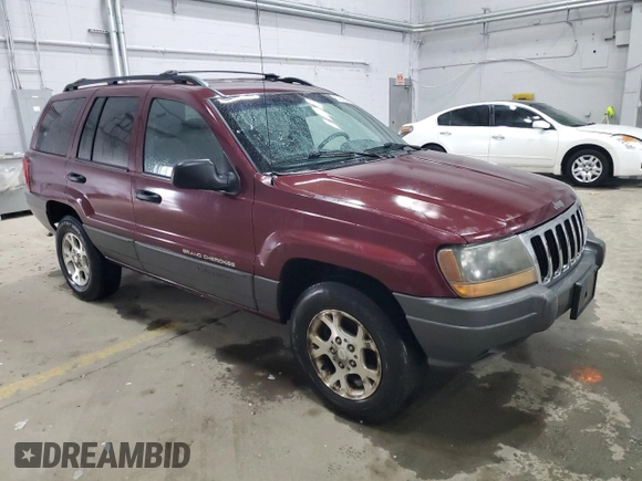 2001 Jeep Grand Cherokee Laredo with VIN 1J4GW48S11C618478, listed as a Copart auction lot 57889965 with Not provided miles and Clean title. Bid and sale history available at DreamBid. Image 4.