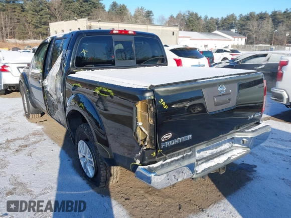 2018 Nissan Frontier SV with VIN 1N6AD0EV0JN718047, listed as a IAAI auction lot 41310302 with 103,488 mi miles and . Bid and sale history available at DreamBid. Image 3.