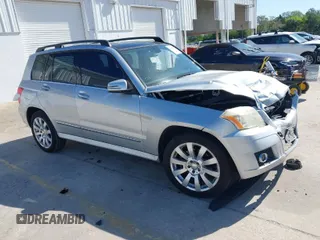 2012 Mercedes-Benz GLK GLK 350 with VIN WDCGG8HB1CF771982, listed as a IAAI auction lot 41958903 with 136,465 mi miles. Bid and sale history available at carsss.com. Image 1.