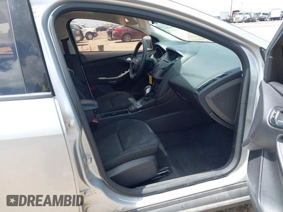 2015 Ford Focus SE with VIN 1FADP3F28FL205635, listed as a IAAI auction lot 42535860 with 135,994 mi miles and . Bid and sale history available at DreamBid. Image 5.