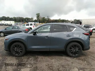 2023 Mazda CX-5 2.5 S Carbon Edition with VIN JM3KFBCM1P0209900, listed as a IAAI auction lot 37342913 with 3,853 mi miles. Bid and sale history available at carsss.com. Image 14.