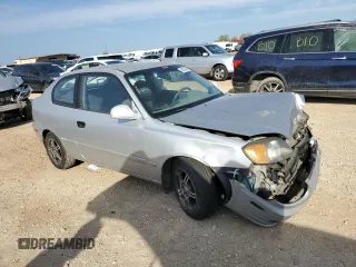 2004 Hyundai Accent GL with VIN KMHCG35C94U292013, listed as a Copart auction lot 84253364 with 0 mi miles and Salvage Title. Bid and sale history available at carsss.com. Image 4.