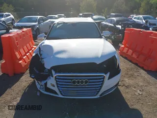 2013 Audi A8 4.0L with VIN WAUA2AFD9DN017867, listed as a IAAI auction lot 40430651 with 114,928 mi miles and . Bid and sale history available at DreamBid. Image 12.