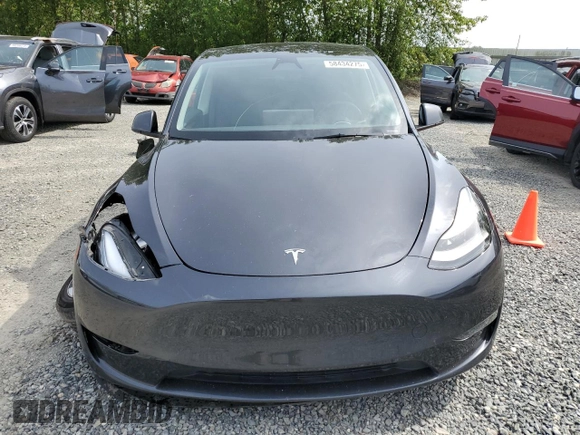 2024 Tesla Model Y Long Range z VIN 7SAYGDEE8RF986258, wystawiony jako Copart lot #58434275 z przebiegiem 59 934 mil mil oraz Szkoda całkowita • Salvage title. Historia ofert i sprzedaży dostępna na DreamBid. Obrazek 5.